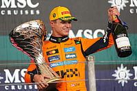 Sao Paulo Grand Prix 2025: Norris Wins, Antonelli Secures Second, Verstappen Climbs To Third | Photo: AP/Andre Penner : McLaren driver Lando Norris of Britain celebrates on the podium his first place in the Brazilian Formula One Grand Prix at the Interlagos race track in Sao Paulo.
