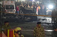 Car In Delhi Blast Was Hyundai i20 With Haryana Plates, Explosion Towards Rear | Photo: Suresh K. Pandey/Outlook : Police, security and rescue personnel at the site after a blast in a parked car near Red Fort left multiple vehicles in flames, in New Delhi.