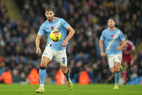 Manchester City's Ruben Dias in action during the English Premier League soccer match between Manchester City and Liverpool in Manchester, England.
