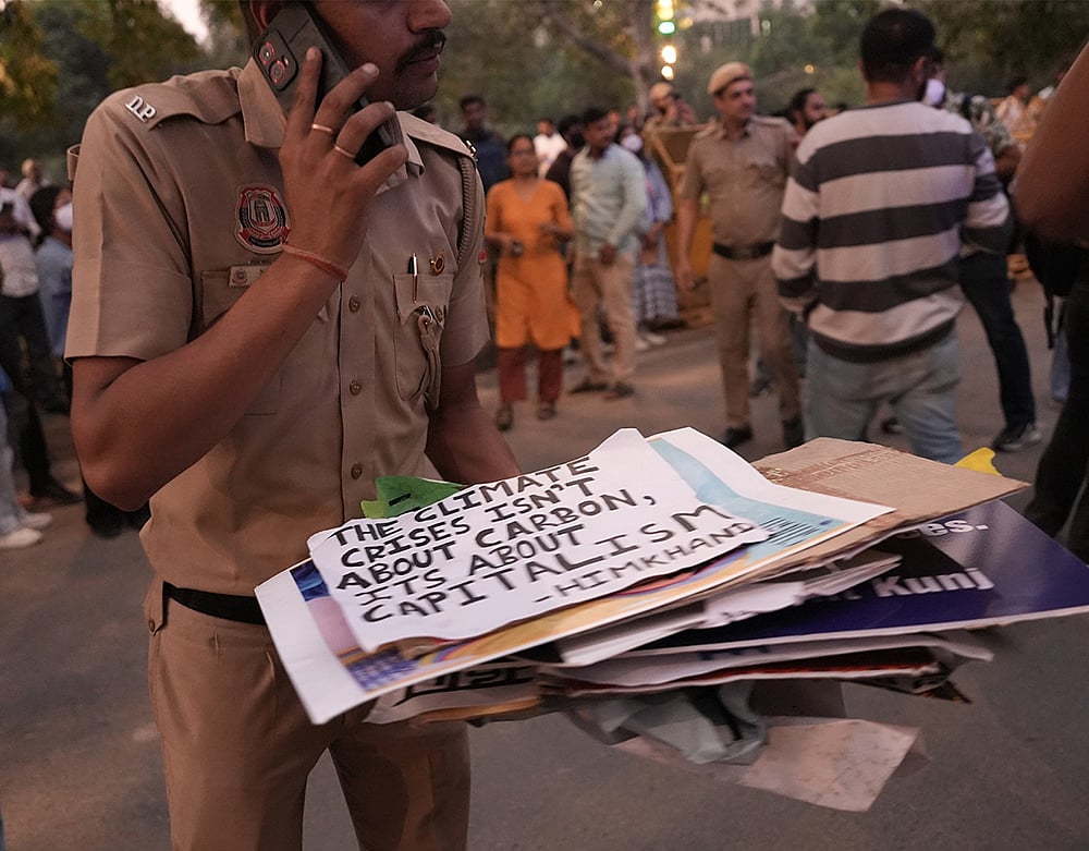 Dozens were detained at India Gate during a clean air protest in New Delhi.