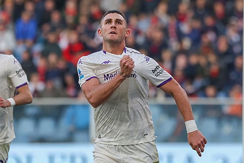 Fiorentina's Roberto Piccoli celebrates after scoring during the Serie A soccer match between Genoa and Fiorentina, in Genoa, Italy.