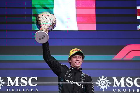 Mercedes driver Kimi Antonelli of Italy celebrates on the podium his second place during the Brazilian Formula One Grand Prix at the Interlagos race track, in Sao Paulo.