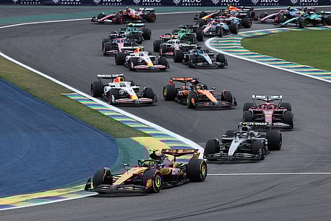 McLaren driver Lando Norris of Britain leads the field after the start the Brazilian Formula One Grand Prix at the Interlagos race track, in Sao Paulo.
