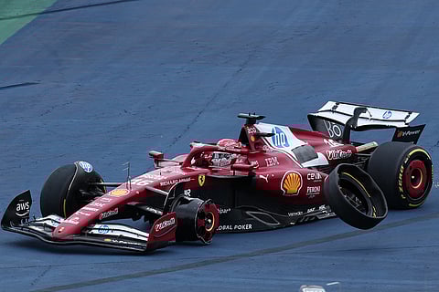 Ferrari driver Charles Leclerc of Monaco loses a tyre during the Brazilian Formula One Grand Prix at the Interlagos race track, in Sao Paulo.