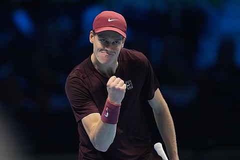 Italy's Jannik Sinner celebrates after winning a point to Canada's Felix Auger-Aliassime during their tennis match of the ATP World Tour Finals, in Turin, Italy.