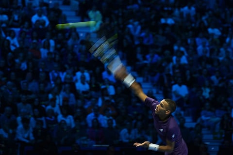 Canada's Felix Auger-Aliassime returns the ball to Italy's Jannik Sinner during their tennis match of the ATP World Tour Finals, in Turin, Italy.