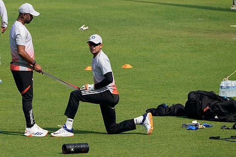 Captain Shubman Gill, right, takes a physical training during a practice session ahead of the first test match between India and South Africa, in Kolkata.