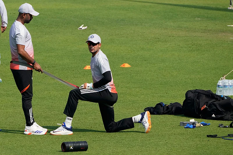 Captain Shubman Gill, right, takes a physical training during a practice session