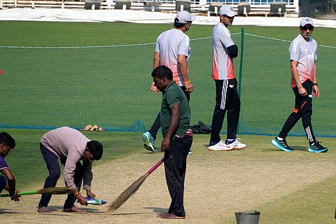 Chief coach Gautam Gambhir, right, followed by captain Shubman Gill inspects the pitch during a practice session ahead of the first test match between India and South Africa, in Kolkata.