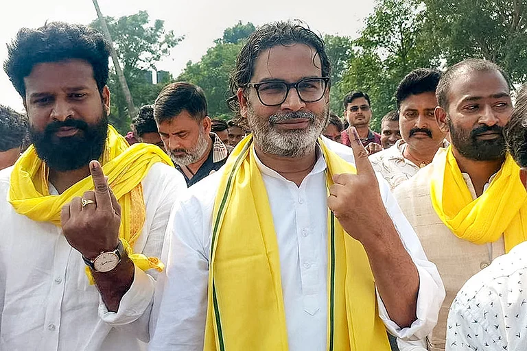 Jan Suraaj leader Prashant Kishor shows his ink-marked finger after casting a vote during the second and final phase of the Bihar Assembly elections, in Rohtas. - Photo: PTI