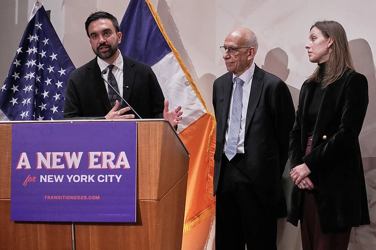 New York Mayor-elect Zohran Mamdani, left, announces the appointment of Dean Fuleihan, center, as first deputy mayor and Elle Bisgaard-Church as chief of staff, in New York, Monday, Nov. 10, 2025. - Richard Drew/AP