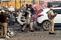 Red Fort Blast Likely Accidental During Transport Of Explosives, Delhi Police Say Photo: PTI/Kamal Kishore : Police personnel at the site in the aftermath of the blast that occurred near Red Fort Metro Station on Monday, killing at least nine people and gutting several vehicles, in New Delhi.