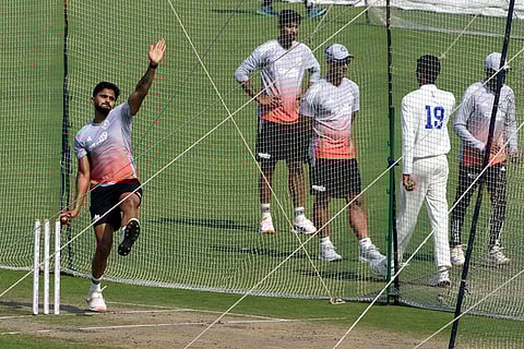 Nitish Kumar Reddy bowls at net during a practice session ahead of the first test match between India and South Africa, in Kolkata.