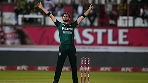 Photo: AP/Themba Hadebe : PAK vs SA: Pakistan pacer Shaheen Shah Afridi celebrates a wicket.