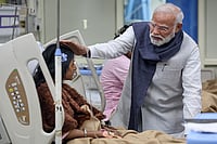 Red Fort Blast Raised in Parliamentary Panel Meet, Chair Declines Discussion | Photo: PMO via PTI : In this image, Prime Minister Narendra Modi meets an injured victim undergoing treatment at LNJP hospital following a blast near the Red Fort, in New Delhi.