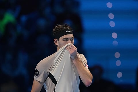 United States' Taylor Fritz reacts during the tennis match of the ATP World Tour Finals against Spain's Carlos Alcaraz, in Turin, Italy.