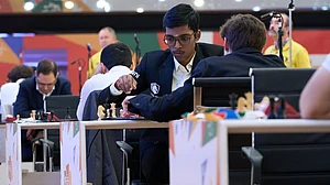 Eteri Kublashvili/FIDE : R Praggnanandhaa making his move against Daniil Dubov in round four, game two of FIDE Chess World Cup 2025 in Panaji.