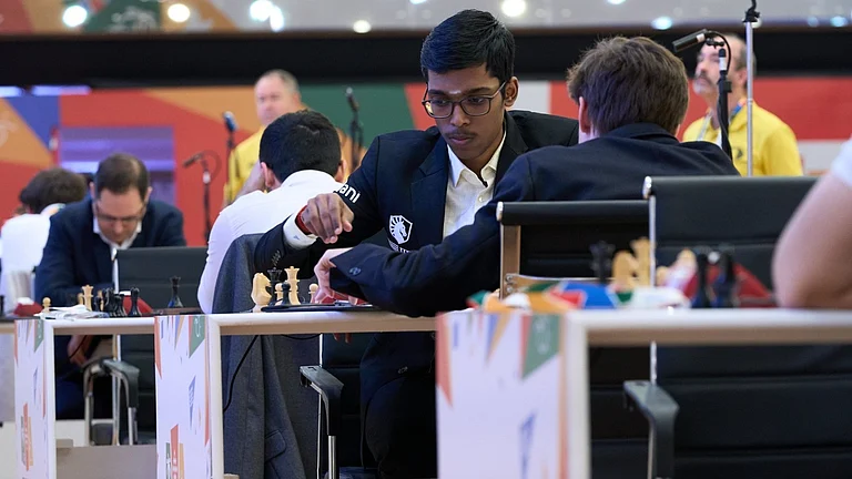 R Praggnanandhaa making his move against Daniil Dubov in round four, game two of FIDE Chess World Cup 2025 in Panaji. - Eteri Kublashvili/FIDE