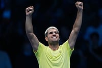 ATP Finals 2025: Carlos Alcaraz Overcomes Taylor Fritz In 3-Set Thriller | Photo: AP/Antonio Calanni : Spain's Carlos Alcaraz celebrates after winning against United States' Taylor Fritz during their tennis match of the ATP World Tour Finals, in Turin, Italy.