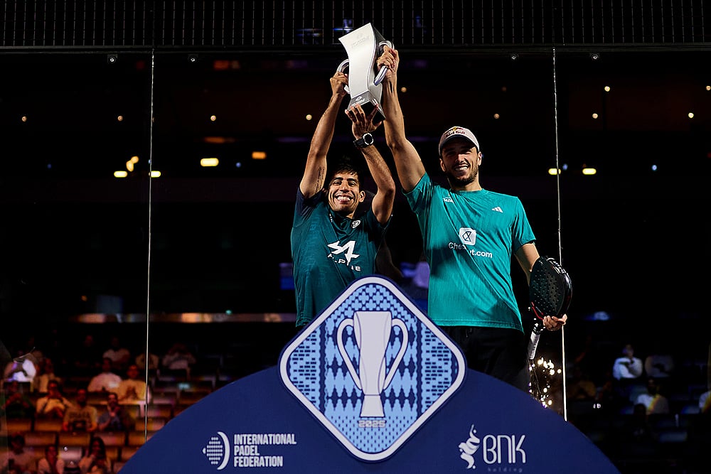 Federico Chingotto and Alejandro Galan pose with their winner trophies during the trophy ceremony of the FIP World Cup in Pairs, Kuwait on November 9, 2025. - | Photo: Premier Padel / Red Bull Content Pool