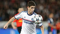 Former Chelsea Player Oscar Hospitalised After Cardiac Complications In Pre-Season Testing AP/File Photo : Chelsea's Oscar eyes the ball during the Champions League quarterfinal first leg soccer match between PSG and Chelsea, at the Parc des Princes stadium.