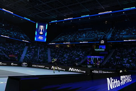 Australia's Alex de Minaur returns the ball to Italy's Lorenzo Musetti during their tennis match of the ATP World Tour Finals, in Turin, Italy.