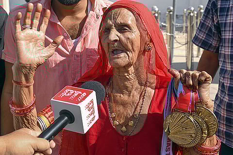 Ninety-four-year-old Pani Devi, who participated in the 23rd Asia Masters Athletics Championship held in Chennai from Nov. 5 to 9 and won four gold medals, speaks during an interview with PTI, in Bikaner.
