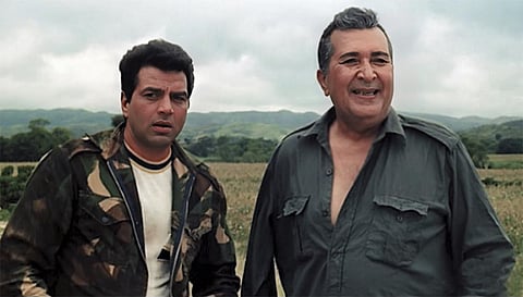 Mera Gaon Mera Desh (1971): As Ajit, a small-time thief yearning for redemption, Dharmendra laid the groundwork for the heroic everyman he would go on to immortalize in Sholay.