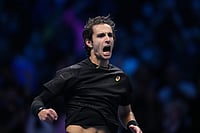 | Photo: AP/Antonio Calanni : Italy's Lorenzo Musetti celebrates after winning against Australia's Alex de Minaur during their tennis match of the ATP World Tour Finals, in Turin, Italy.