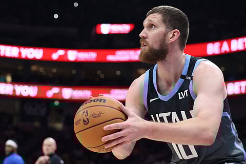 Utah Jazz guard Svi Mykhailiuk takes a three-point shot against the Indiana Pacers during the first half of an NBA basketball game in Salt Lake City. 