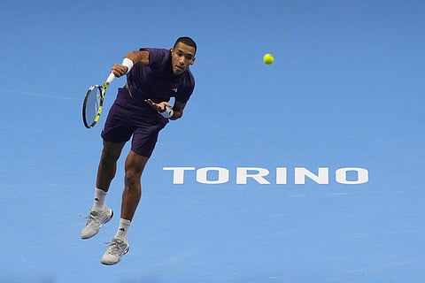 Canada's Felix Auger-Aliassime serves the ball to United States' Ben Shelton during their tennis match of the ATP World Tour Finals, in Turin, Italy.
