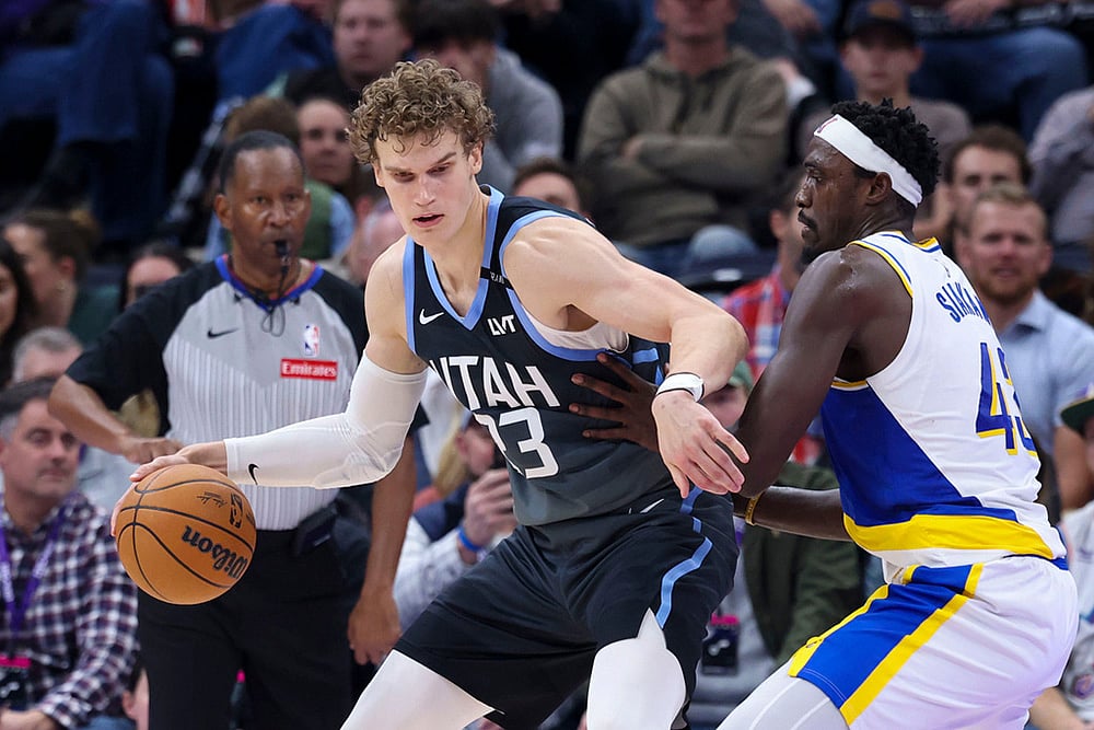 Utah Jazz forward Lauri Markkanen (23) posts up against Indiana Pacers forward Pascal Siakam (43) during the second half of an NBA basketball game in Salt Lake City.  - | Photo: AP/Rob Gray