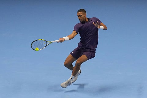 Canada's Felix Auger-Aliassime returns the ball to United States' Ben Shelton during their tennis match of the ATP World Tour Finals, in Turin, Italy.