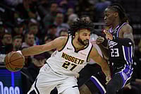 NBA: Nikola Jokic Helps Denver Nuggets Beat Sacramento Kings 122-108 In Fifth Straight Win | Photo: AP/Randall Benton : Denver Nuggets guard Jamal Murray (27) drives past Sacramento Kings guard Keon Ellis (23) during the second half of an NBA basketball game in Sacramento, California.