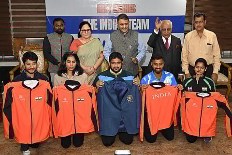 Athletes and officials display the Indian kit that they will wear at the Deaflympics 2025 in Tokyo.