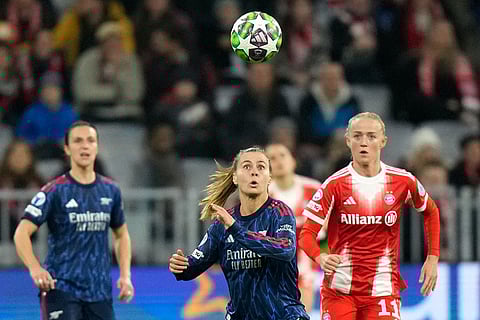 Arsenal's Victoria Pelova eyes the ball during the women's Champions League opening phase soccer match between FC Bayern Munich and Arsenal FC in Munich, Germany.