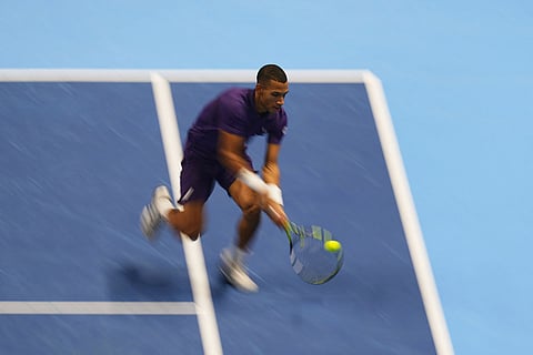 Canada's Felix Auger-Aliassime returns the ball to United States' Ben Shelton during their tennis match of the ATP World Tour Finals, in Turin, Italy.