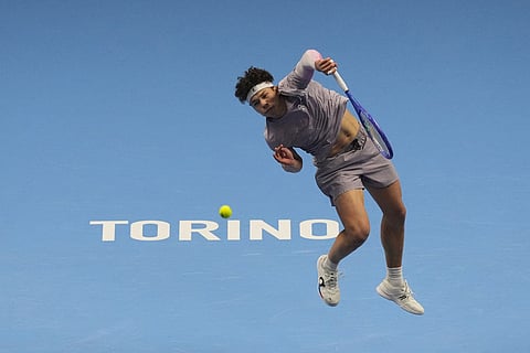 United States' Ben Shelton serves the ball to Canada's Felix Auger-Aliassime during their tennis match of the ATP World Tour Finals, in Turin, Italy.