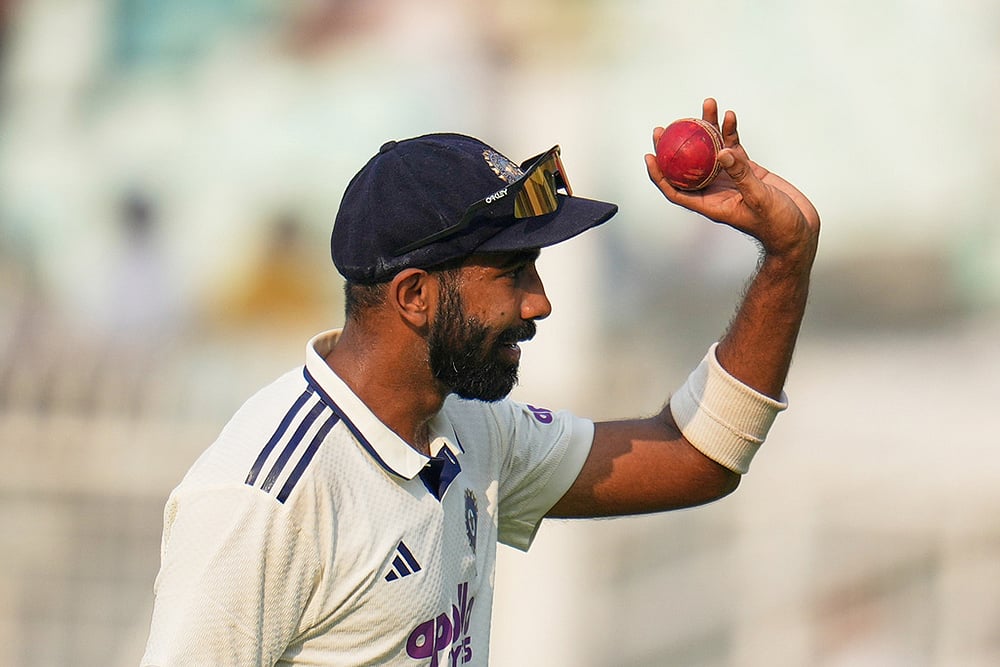 | Photo: AP/Aijaz Rahi : India's Jasprit Bumrah celebrates after a five-wicket haul on the first day of the first cricket test match between India and South Africa in Kolkata.