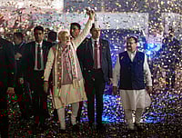 PM Modi's Bihar Victory Speech: NDA's Historic Win Signals End of 'Katta Sarkar' Era Ravi Choudhary : Prime Minister Narendra Modi waves a as he arrives during the celebration of NDA victory in the Bihar Assembly elections, at BJP headquarters, in New Delhi, Friday, Nov. 14, 2025. Union Health Minister and BJP National President JP Nadda is also seen.