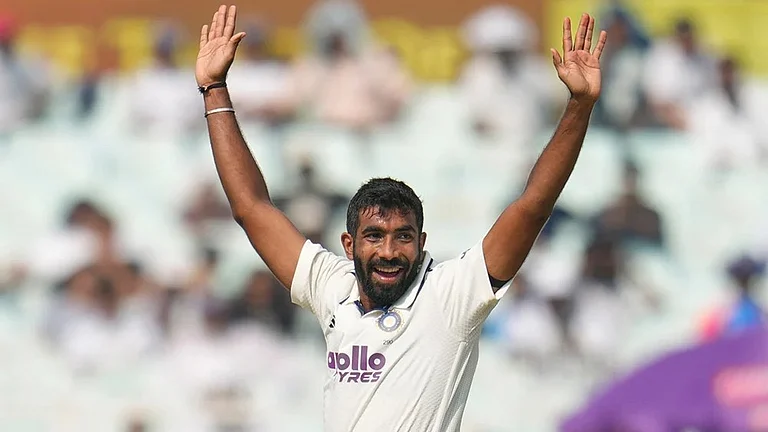 India's Jasprit Bumrah celebrates the dismissal of South Africa's Tony de Zorzi on the first day of the first cricket test match between India and South Africa in Kolkata. - | Photo: AP/Aijaz Rahi