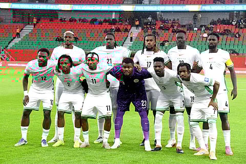 Nigeria's team players pose for a picture before the World Cup 2026 African qualifying semi-final soccer match between Nigeria and Gabon, in Rabat, Morocco.
