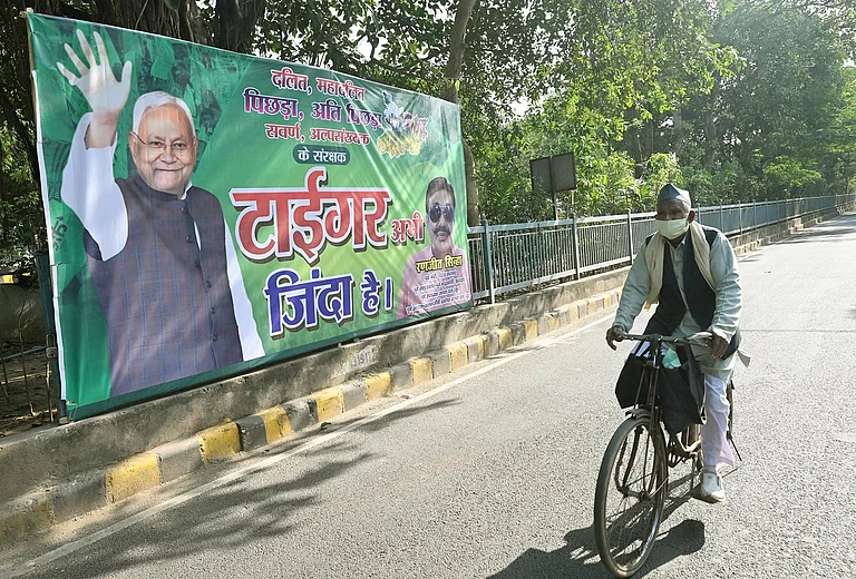 JDU supporters put posters reading Tiger Zinda Hai featuring Bihar CM Nitish Kumar outside of JDU office on the eve of vote counting for Bihar Assembly Elections 2025 on November 13, 2025 in Patna, India. - IMAGO / Hindustan Times