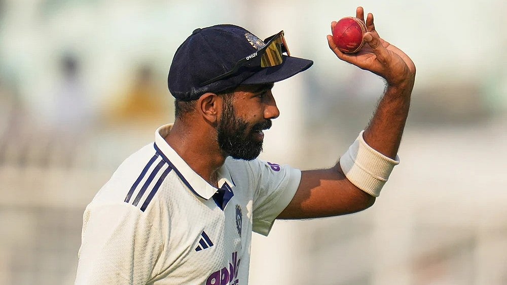 India's Jasprit Bumrah celebrates after a five-wicket haul on the first day of the first cricket test match between India and South Africa in Kolkata. - | Photo: AP/Aijaz Rahi