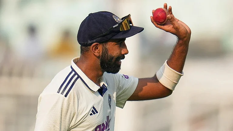 India's Jasprit Bumrah celebrates after a five-wicket haul on the first day of the first cricket test match between India and South Africa in Kolkata. - | Photo: AP/Aijaz Rahi