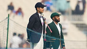 (AP Photo/Aijaz Rahi) : India Vs South Africa Toss Update, 1st Test: India's captain Shubman Gill, left, and South Africa's captain Temba Bavuma pose with the trophy before the start of of the first day of the first cricket test match between India and South Africa in Kolkata, India, Friday, Nov. 14, 2025.