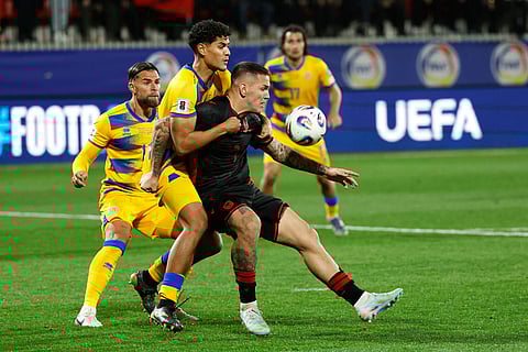 Andorra's Ian Olivera fights for the ball with Albania's Rey Manaj, right, during a World Cup 2026 group K qualifying soccer match between Andorra and Albania in Encamp, Andorra.
