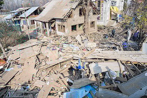 Debris at the site after the house of Dr Umar Nabi, who drove the explosive-laden car involved in the Delhi blast, was demolished by security forces, in Jammu and Kashmir's Pulwama district.