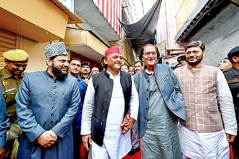 Samajwadi Party President Akhilesh Yadav with Urdu poet Waseem Barelvi, in Bareilly, Uttar Pradesh. 