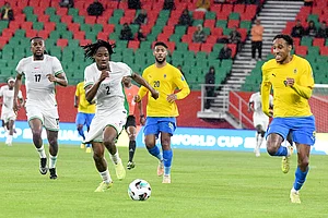 | Photo: AP : Nigeria's Benjamin Fredrick, centre left, and Gabon's Pierre-Emerick Aubameyang, right, challenge for the ball during the World Cup 2026 African qualifying semi-final soccer match between Nigeria and Gabon, in Rabat, Morocco.